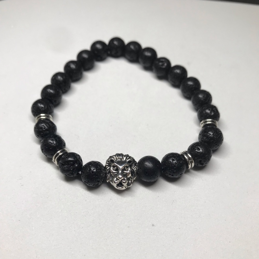 Lava stone silver accent lion bracelet